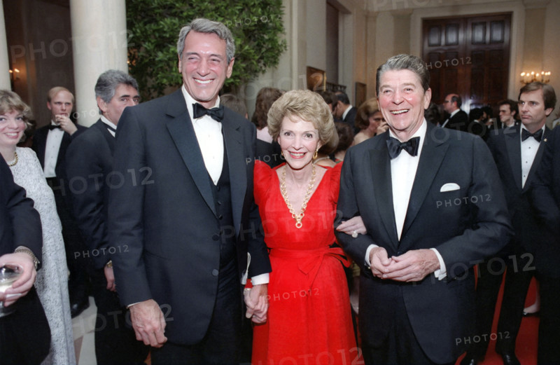 U.S. President Ronald Reagan and U.S. First Lady Nancy Reagan Posing with American actor Rock Hudson at White House State Dinner for Mexican President Miguel de la Madrid, White House, Washington, D.C., USA, President Ronald Reagan White House Photographic Office, May 15, 1984