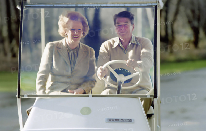 U.S. President Ronald Reagan driving golf cart with British Prime Minister Margaret Thatcher, Camp David, Frederick County, Maryland, USA, President Ronald Reagan White House Photographic Office, December 22, 1984