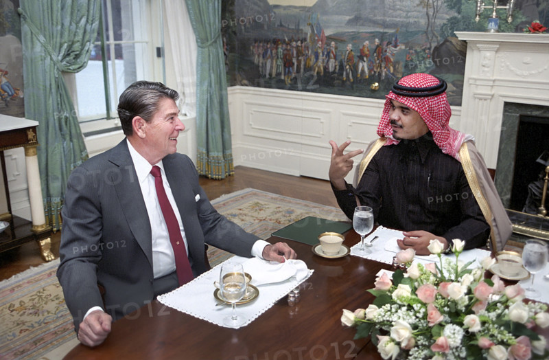 U.S. President Ronald Reagan at private breakfast meeting with Prince Bandar Ibn Sultan Al Saud during state visit of King Fahd of Saudi Arabia, Diplomatic Reception Room, White House, Washington, D.C., USA, President Ronald Reagan White House Photographic Office, February 12, 1985