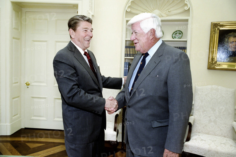 U.S. President Ronald Reagan with Speaker of The House Thomas P. "Tip" O'Neill, Jr. in Oval Office of the White House, Washington, D.C., USA, President Ronald Reagan White House Photographic Office, March 7, 1985