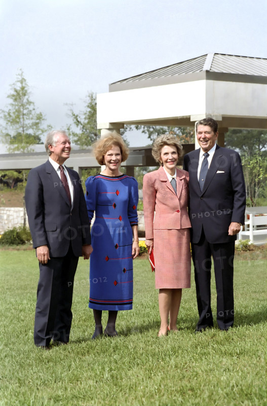 U.S. President Ronald Reagan and U.S. First Lady Nancy Reagan with former U.S. President Jimmy Carter and former U.S. First Lady Rosalynn Carter at dedication ceremony of Carter Presidential Library, Atlanta, Georgia, USA, President Ronald Reagan White House Photographic Office, October 1, 1986