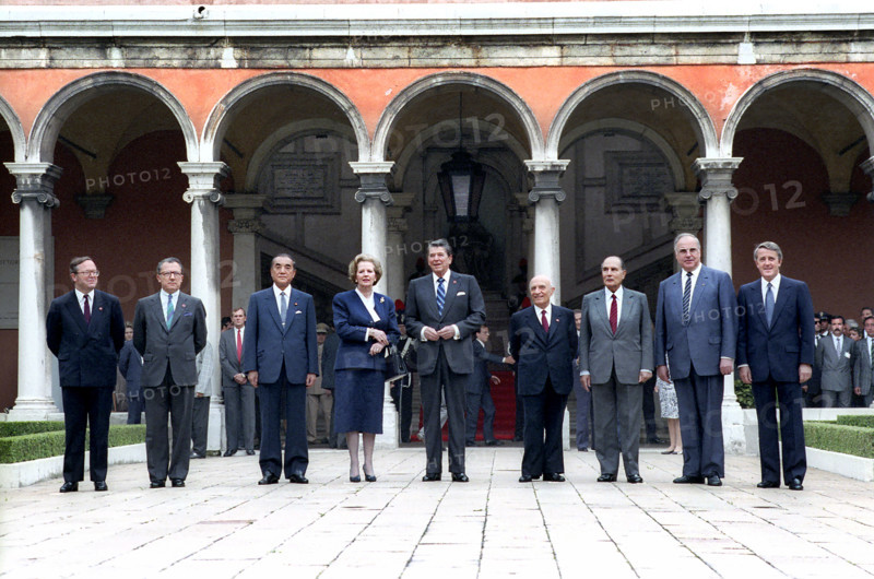 Prime Minister of Belgium Wilfried Martens, President of the European Commission Jacques Delors, Prime Minister of Japan, Yasuhiro Nakasone, Prime Minister of United Kingdom Margaret Thatcher, U.S. President Ronald Reagan, Prime Minister of Italy Amintore Fanfani, President of France Francois Mitterand, Chancellor of Germany Helmut Kohl and Prime Minister of Canada Brian Mulroney attending G-7 Economic Leaders Summit, Giorgio Cini Foundation, Venice, Italy, President Ronald Reagan White House Photographic Office, June 9, 1987