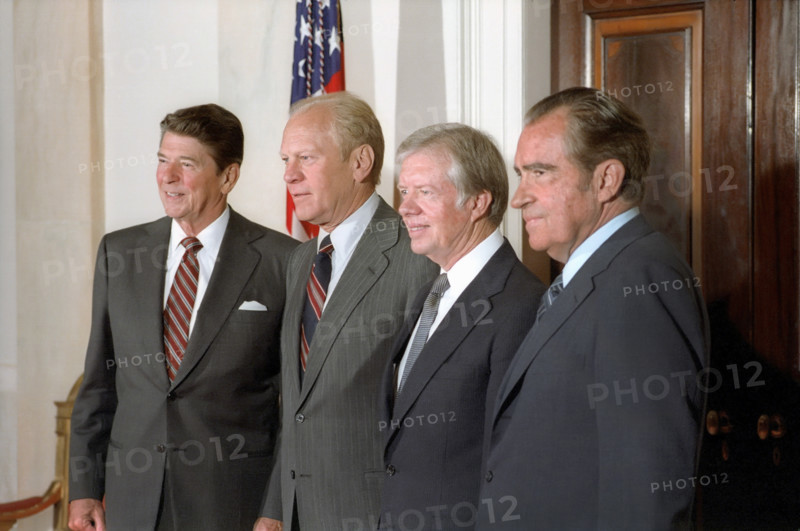 U.S. President Ronald Reagan with former U.S. Presidents Gerald Ford, Jimmy Carter and Richard Nixon prior to their departure for the funeral of President Anwar Sadat of The Arab Republic of Egypt, Washington, D.C., USA, President Ronald Reagan White House Photographic Office, October 8, 1981