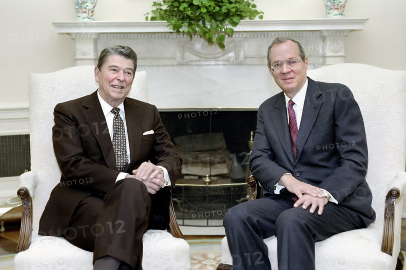 U.S. President Ronald Reagan meeting with Judge Anthony Kennedy in the White House Oval Office, Washington, D.C., USA, President Ronald Reagan White House Photographic Office, November 11, 1987