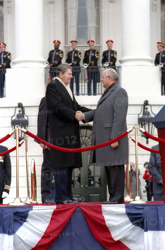 U.S. President Ronald Reagan and Soviet General Secretary Mikhail Gorbachev shaking hands at arrival ceremony on White House South Lawn, Washington, D.C., USA, President Ronald Reagan White House Photographic Office, December 8, 1987