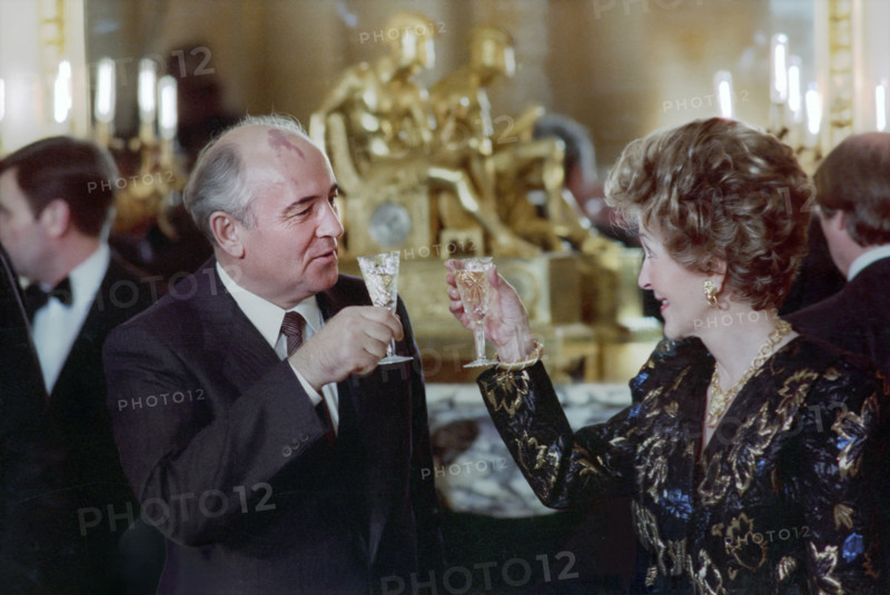Soviet General Secretary Mikhail Gorbachev and U.S. First Lady Nancy Reagan toasting champagne at Soviet Embassy, Washington, D.C.., USA, President Ronald Reagan White House Photographic Office, December 9, 1987
