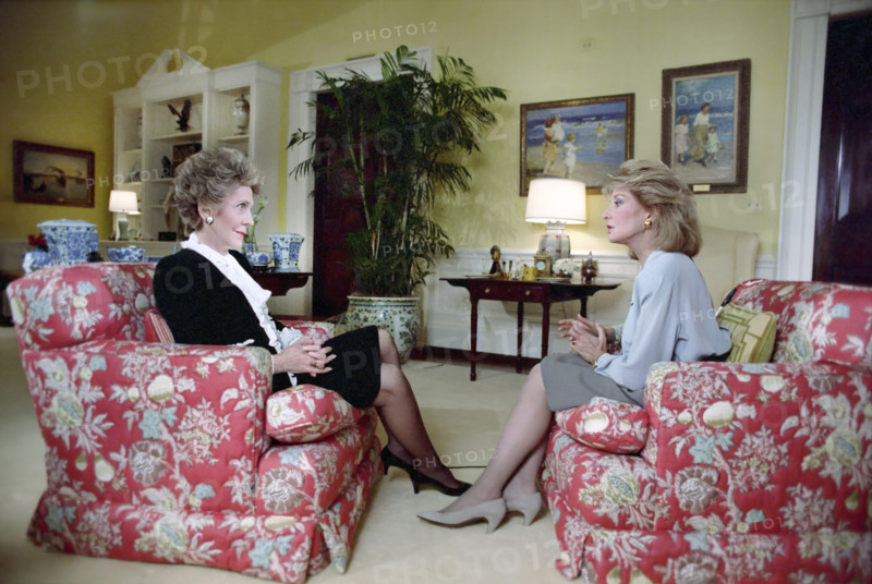 U.S. First Lady Nancy Reagan seated with American journalist Barbara Walters during interview in White House residence, Washington, D.C., USA, President Ronald Reagan White House Photographic Office, February 3, 1988