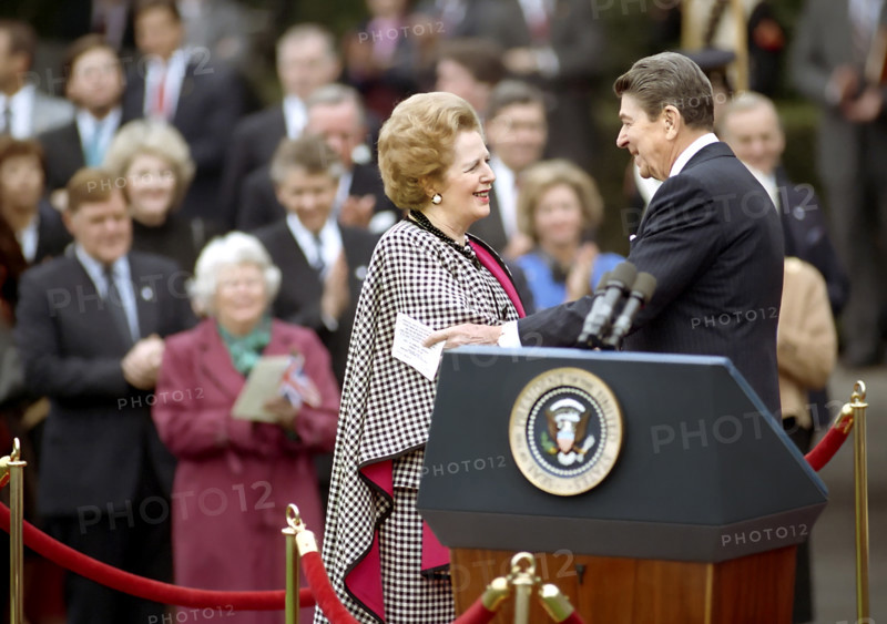 U.S. President Ronald Reagan with British Prime Minister Margaret Thatcher during Thatcher's arrival ceremony on White House South Lawn, Washington, D.C., USA, President Ronald Reagan White House Photographic Office, November 16, 1988