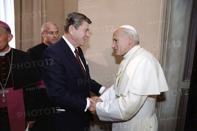U.S. President Ronald Reagan meeting with Pope John Paul II during visit to papal library, Apostolic Palace, Vatican City, President Ronald Reagan White House Photographic Office, June 7, 1982