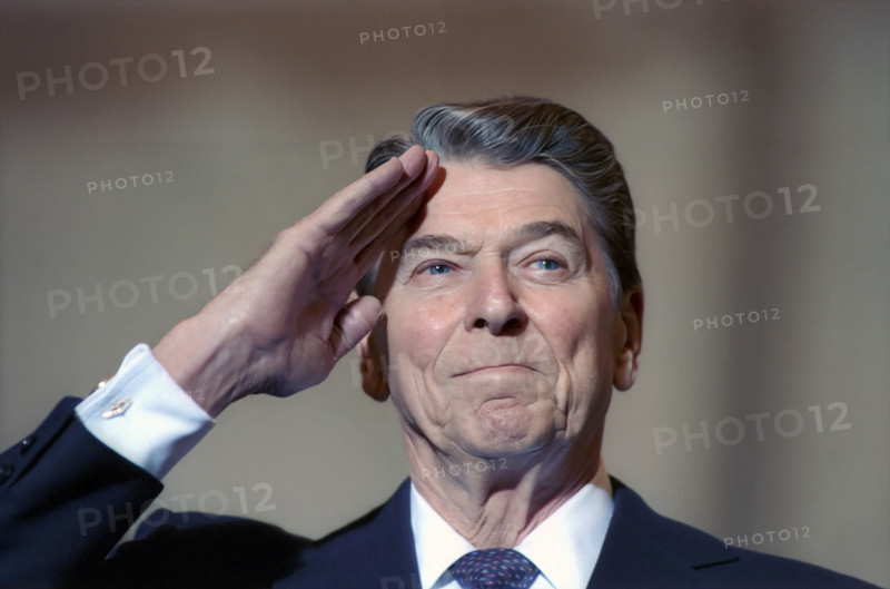 U.S. President Ronald Reagan saluting during Armed Forces Salute to U.S. President Ronald Reagan and U.S. Frist Lady Nancy Reagan, Andrews Air Force Base, Camp Springs, Prince George's County, Maryland, USA, President Ronald Reagan White House Photographic Office, January 12, 1989