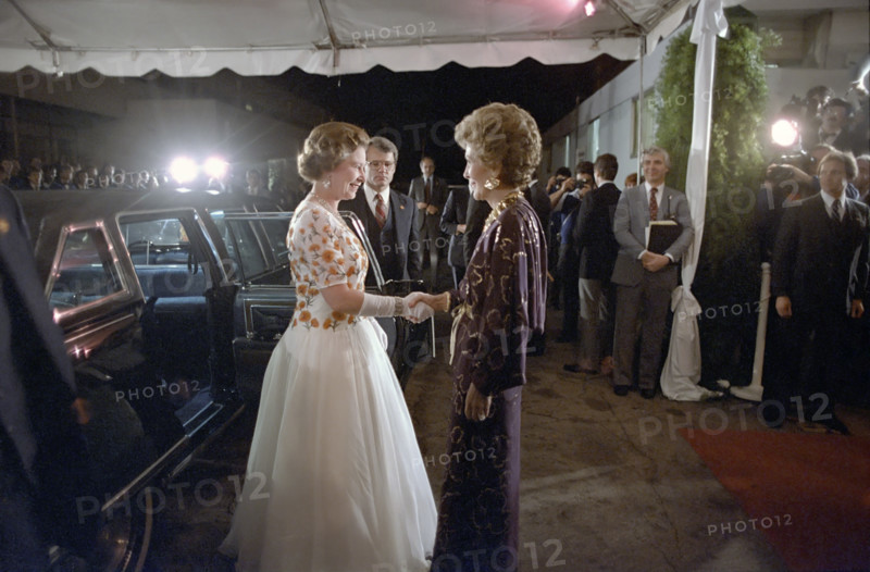 Arrival of Queen Elizabeth II and greeted by U.S. First Lady Nancy Reagan at reception and dinner, 20th Century-Fox Studios, Los Angeles, California, USA, President Ronald Reagan White House Photographic Office, February 27, 1983