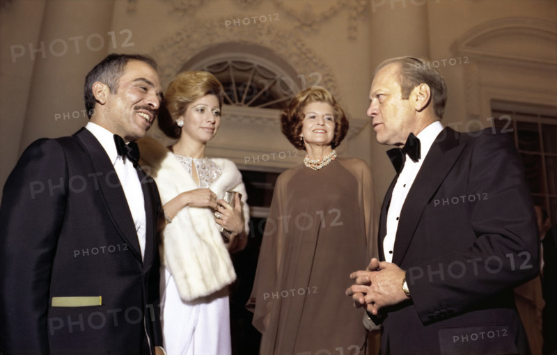 U.S. President Gerald R. Ford and U.S. First Lady Betty Ford saying goodnight to King Hussein and Queen Alia of Jordan as they depart the White House after a state dinner held in their honor, Washington, D.C., USA, Gerald R. Ford White House Photographs, March 30, 1976