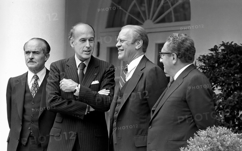 French Minister of Foreign Affairs Jean Sauvagnargues, President Valery Giscard d'Estaing of France, U.S. President Gerald R. Ford and U.S. Secretary of State Henry Kissinger standing near White House Colonnade, Washington, D.C., USA, Gerald R. Ford White House Photographs, May 17, 1976
