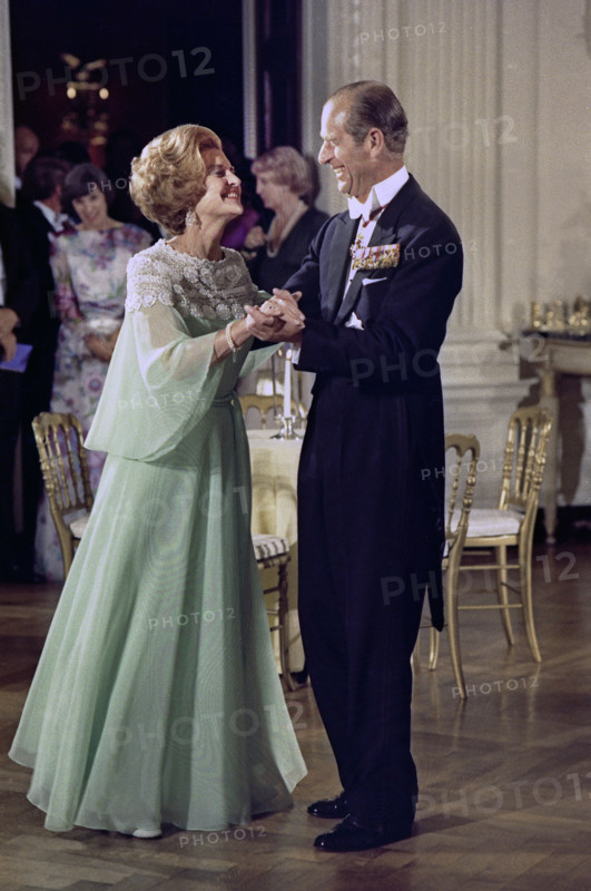 U.S. First Lady Betty Ford Dancing with Prince Philip of Great Britain in the White House State Dining Room during a State Dinner honoring Queen Elizabeth II and Prince Philip, Washington, D.C., USA, Gerald R. Ford White House Photographs, July 7, 1976