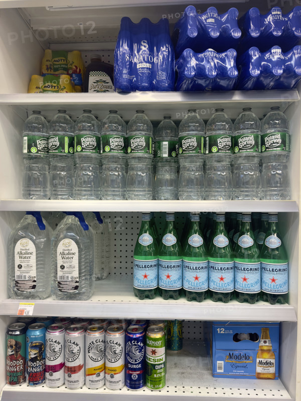 Shelves of bottled water and various beverages, Duane Reade retail store, Tribeca, Manhattan, New York City, New York, USA