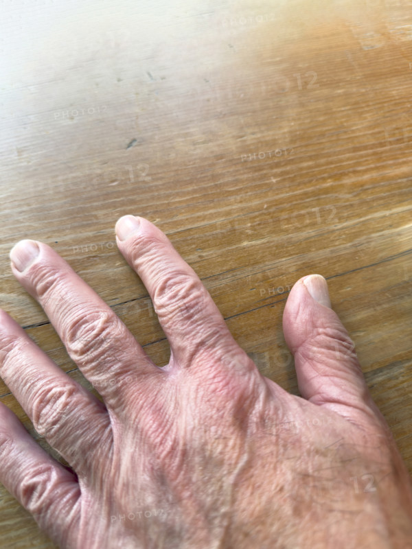 Mature adult man's hand