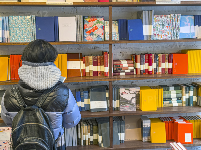 Person shopping for notebooks, Goods For The Study retail store, West Village, Manhattan, New York City, New York, USA