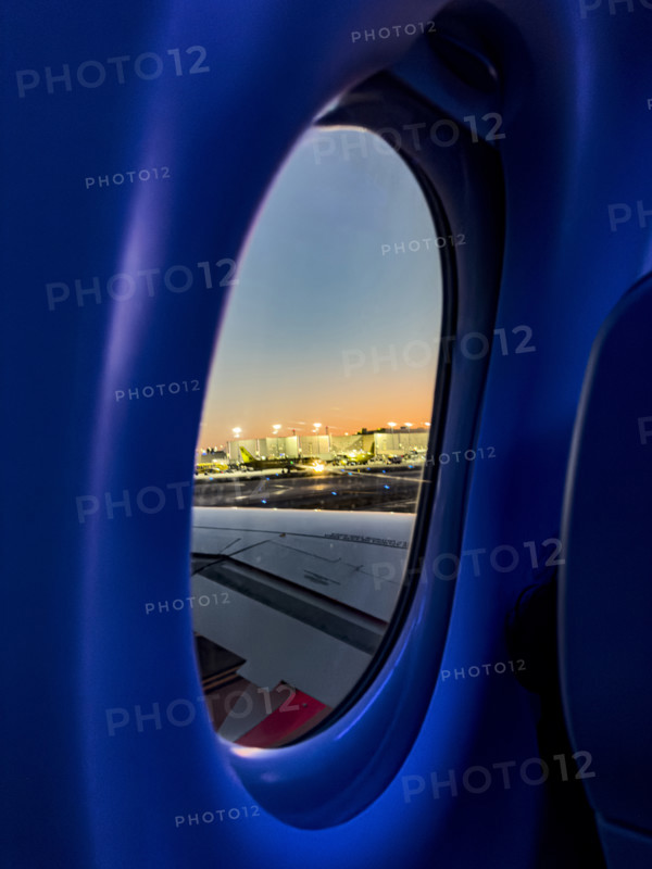 View of airport through window of Jet Blue Airlines commercial airplane, Fort Lauderdale-Hollywood International Airport, Fort Lauderdale, Florida, USA