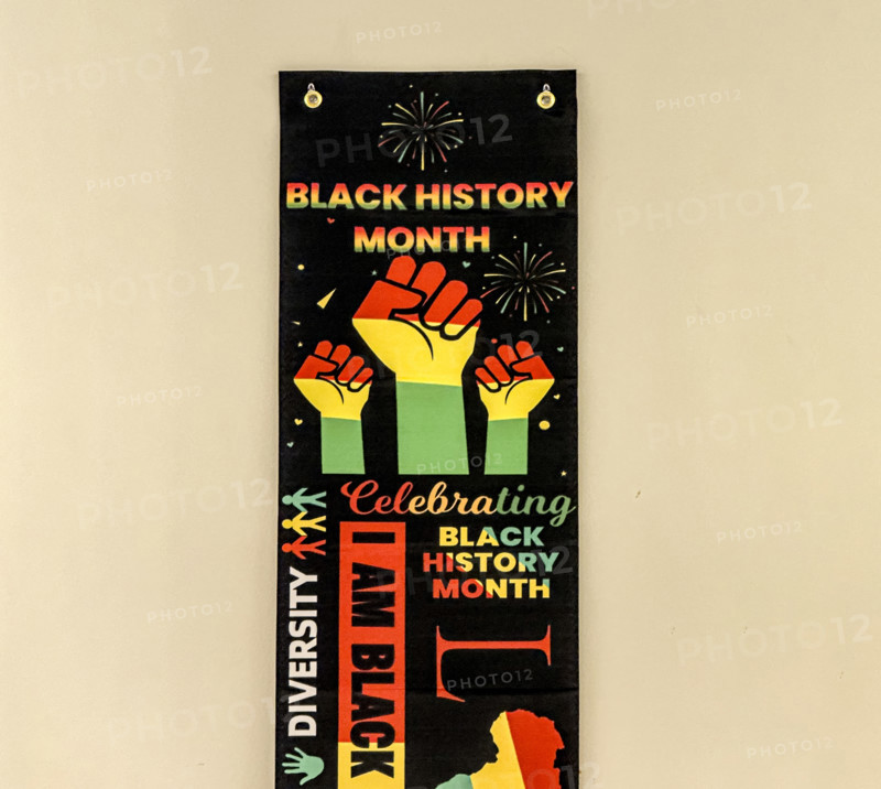 Black History Month banner hanging on wall