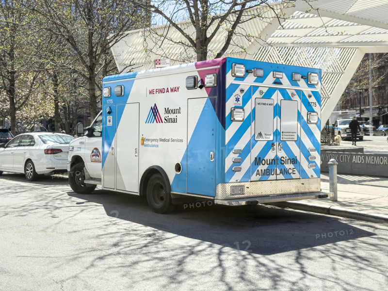 Mount Sinai Hospital EMS ambulance parked on urban street, Chelsea, Manhattan, New York City, New York, USA