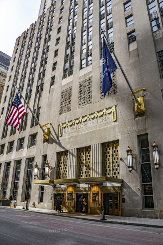 The Waldorf Astoria, luxury hotel and condominium residence, building exterior and street scene, Lexington Avenue, Manhattan, New York City, New York, USA