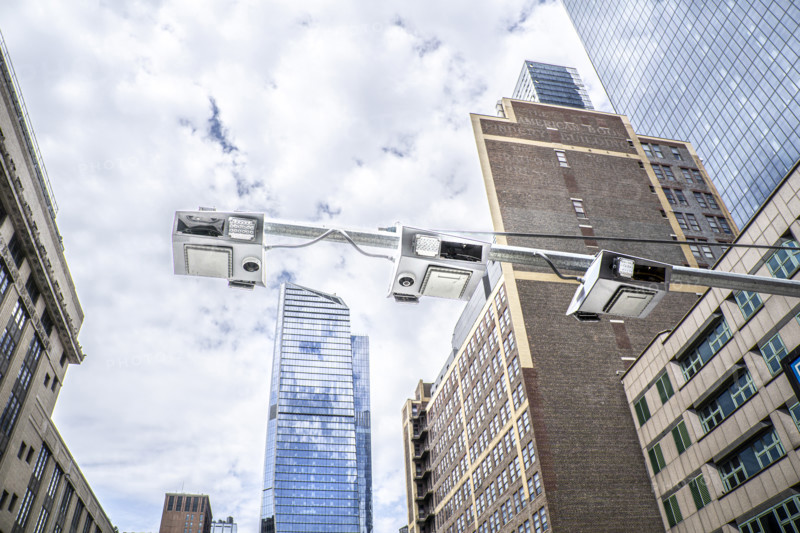 Low angle view of congestion pricing scanners with cityscape in background, Hudson Yards, New York City, New York, USA