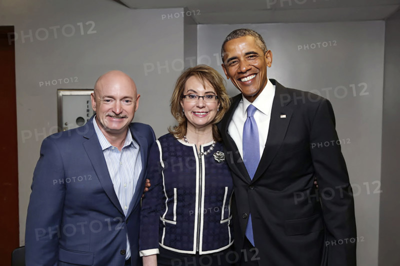 U.S. President Barack Obama meeting with former Arizona Representative Gabby Giffords and husband Mark Kelly at Central High School on four-year anniversary of mass shooting that left her gravely wounded, Phoenix, Arizona, USA, Pete Souza, Office of White House Photography, January 8, 2015