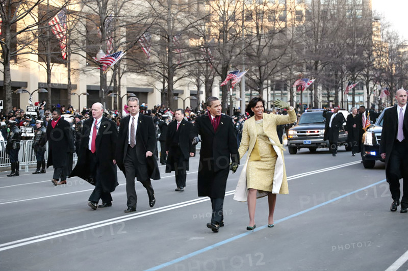 U.S. President Barack Obama and U.S. First Lady Michelle Obama walking on Pennsylvania Avenue during Inaugural Parade, Washington, D.C., USA, Pete Souza, Office of White House Photography, January 20, 2009