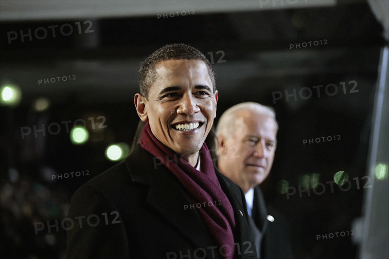 U.S. President Barack Obama  and U.S. Vice President Joe Biden watching Inaugural Parade from reviewing stand on Pennsylvania Avenue, Washington, D.C., USA, Pete Souza, Office of White House Photography, January 20, 2009