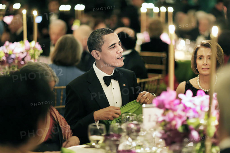 U.S. President Barack Obama (with Nancy Pelosi at right), hosting state dinner in honor of Prime Minister of India Manmohan Singh and his wife, Gursharan Kaur at the White House, Washington, D.C., USA, Pete Souza, Office of White House Photography, November 24, 2009