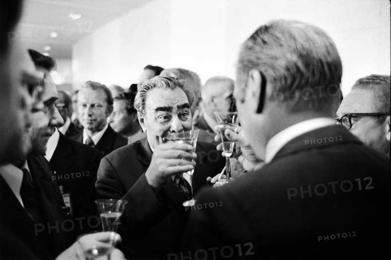 U.S. President Gerald R. Ford and Soviet General Secretary Leonid Brezhnev raising their glasses in a toast following signing of the final act of the Conference on Security and Cooperation in Europe (CSCE), Helsinki, Finland, Gerald R. Ford White House Photographs, August 1, 1975