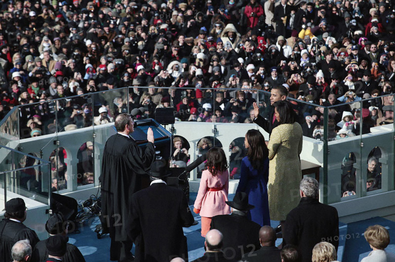 Barack Obama being sworn-in as U.S. President by U.S. Supreme Court Chief Justice John Roberts, as Michelle Obama, Sasha Obama and Malia Obama look on, U.S. Capitol, Washington, D.C., USA, Pete Souza, Office of White House Photography Office, January 20, 2009