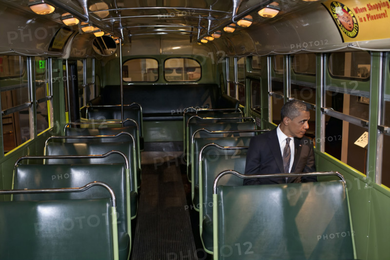 U.S. President Barack Obama sitting on the famed Rosa Parks bus, Henry Ford Museum, Dearborn, Michigan, USA, Pete Souza, Office of White House Photography, April 18, 2012
