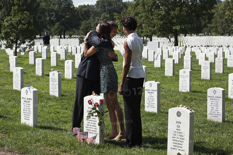U.S. President Barack Obama hugging woman during visit with U.S. First Lady Michelle Obama to Section 60, which is reserved for military personnel who have lost their lives while fighting in Afghanistan and Iraq, Arlington National Cemetery , Arlington, Virginia, USA, Pete Souza, Office of White House Photography Office, September 10, 2011