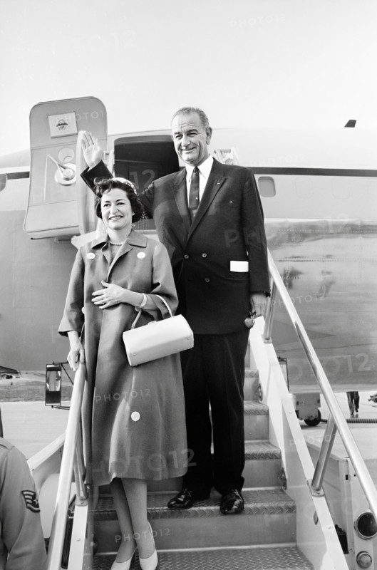 U.S. Vice President Lyndon B. Johnson and U.S. Second Lady Claudia "Lady Bird" Johnson, boarding Air Force airplane to leave for around-the-world trip, Andrews Air Force Base, Maryland, USA, Thomas J. O'Halloran, U.S. News & World Report Magazine Photograph Collection, May 9, 1961
