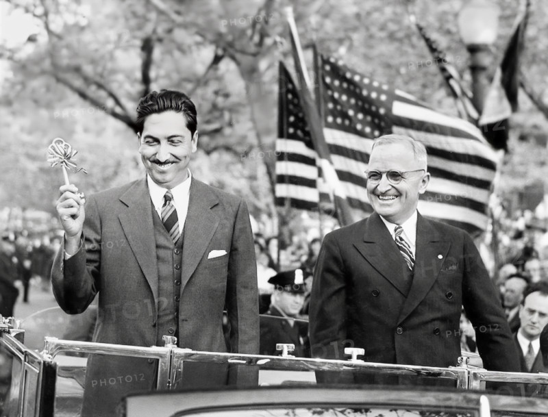 President Miguel Aleman of Mexico (left) holding ceremonial key to city while  U.S. President Harry S. Truman (right) looks on during visit, Washington, D. C, USA, Abbie Rowe, National Parks Service, Harry S. Truman Library, April 29, 1947