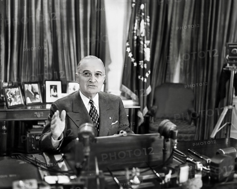 U.S. President Harry S. Truman delivering radio and television address on issue of international arms reduction, White House Oval Office, Washington, D.C., USA, Abbie Rowe, National Parks Service, Harry S. Truman Library, December 7, 1951
