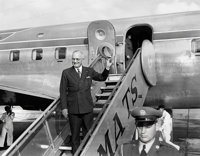 U.S. President Harry S. Truman waving from airplane steps at Washington National Airport prior to the President's departure, Washington, D.C., USA, Abbie Rowe, National Parks Service, Harry S. Truman Library, November 4, 1950