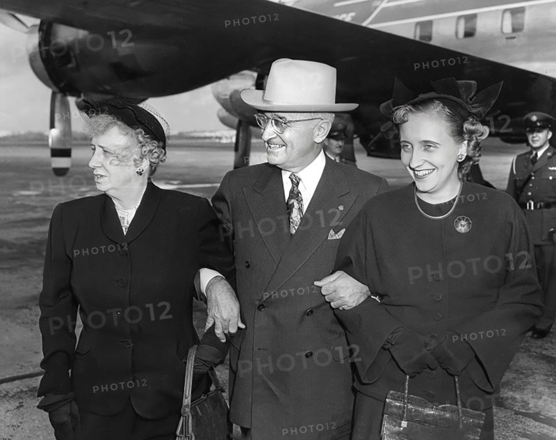 U.S. President Harry S. Truman (center) standing with U.S. First Lady Bess W. Truman (left) and their daughter, Margaret (right), at Washington National Airport prior to the President's departure, Washington, D.C., USA, Abbie Rowe, National Parks Service, Harry S. Truman Library, November 4, 1950