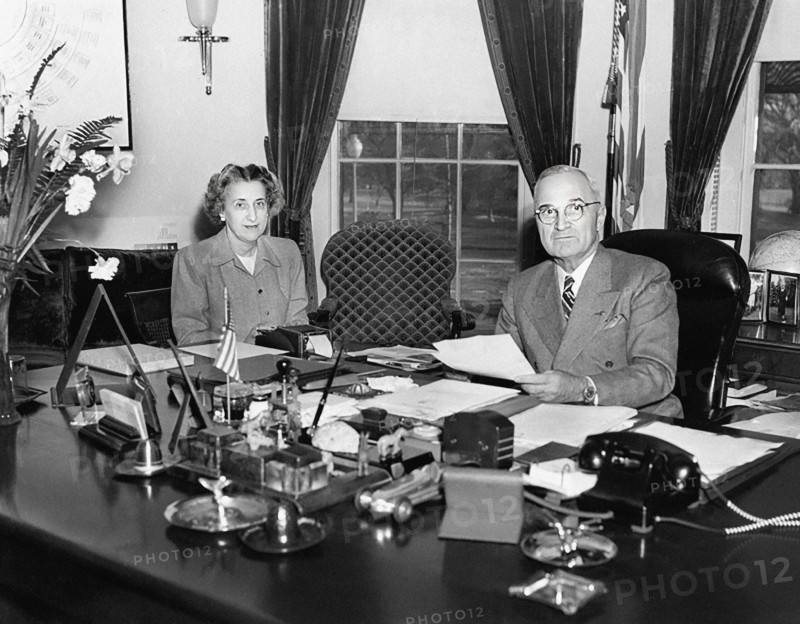 U.S. President Harry S. Truman and Rose Conway, his secretary, at the President's desk in the White House Oval Office, Washington, D.C., USA, Abbie Rowe, National Parks Service, Harry S. Truman Library, February 11, 1947