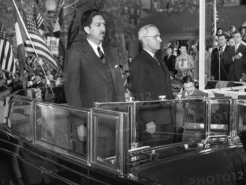 Mexican President Miguel Aleman (left) and U.S. President Harry S. Truman (right) standing in back of an open limousine during welcoming ceremonies in Aleman's honor, Washington, D.C., USA, Abbie Rowe, National Parks Service, Harry S. Truman Library, April 29, 1947