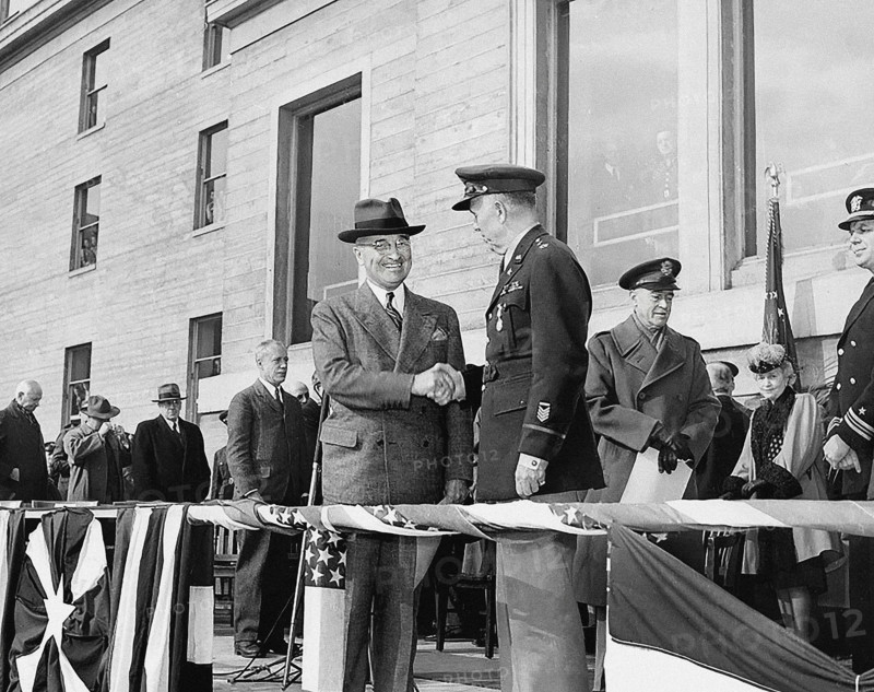 U.S. President Harry S. Truman (right center) shaking hands with retiring U.S. Army Chief of Staff General George C. Marshall (left center) after awarding him with an Oak Leaf Cluster to his Distinguished Service Medal in the Pentagon Court, Arlington, Virginia, USA, Abbie Rowe, National Parks Service, Harry S. Truman Library, November 26, 1945