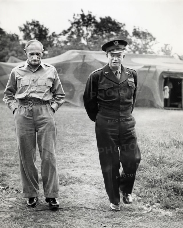 British Field Marshal Bernard L. Montgomery (left) briefing U.S. General Dwight D. Eisenhower (right) on new attacks launched against the Germans, Normandy, France, U.S. Army Signal Corps, July 26, 1944