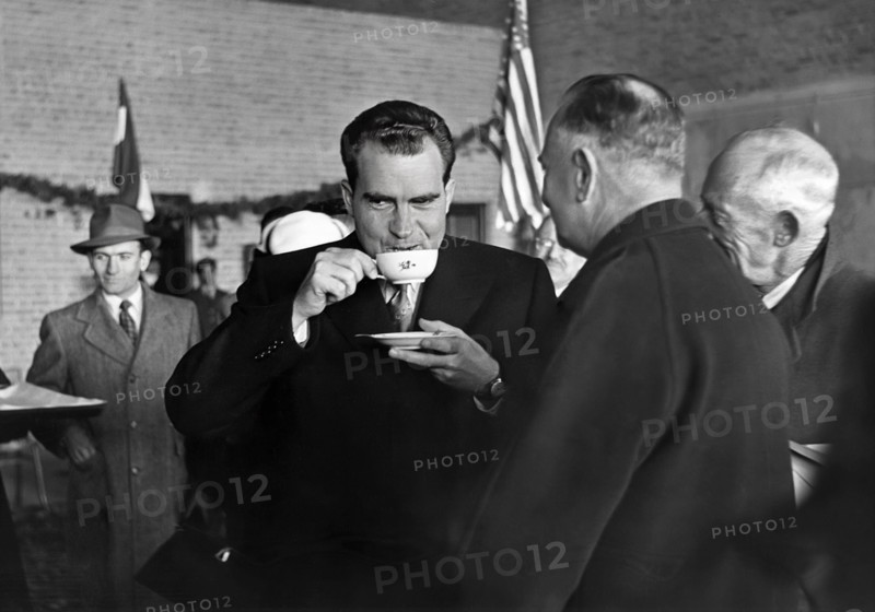 U.S. Vice President Richard Nixon sipping beverage during visit, Tehran, Iran, Richard Nixon Foundation Collection, December 9, 1953