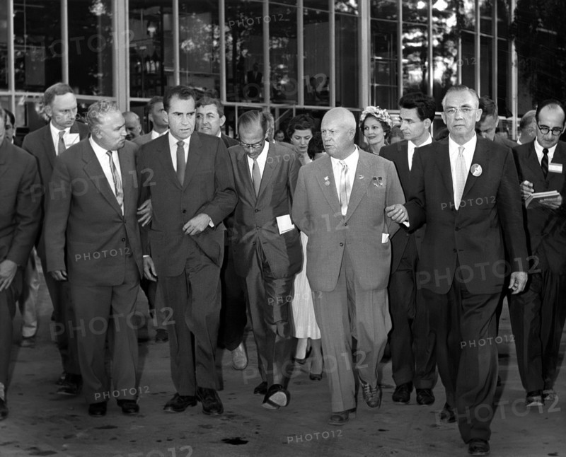 U.S. Vice President Richard Nixon and wife Pat Nixon (background center-right wearing hat) with Soviet Premier Nikita Khrushchev, and others walking in Sokolniki Park before touring American National Exhibition, Moscow, Soviet Union, Richard Nixon Foundation Collection, July 24, 1959