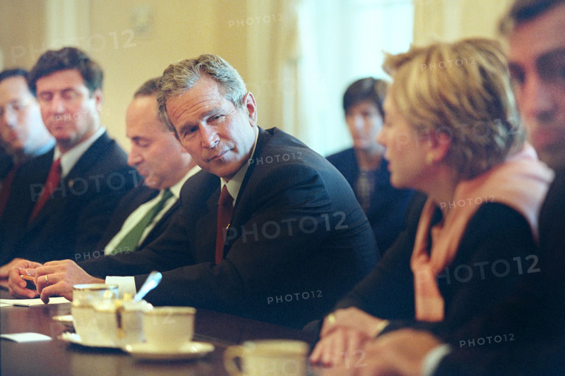 U.S. President George W. Bush meeting with members of congress from states impacted by September 11th terrorist attacks, U.S. Senators from New York Chuck Schumer and Hillary Clinton sit on either side of the President, White House Cabinet Room, Washington, D.C., USA, Paul Morse, George W. Bush White House Photo Office, September 13, 2001