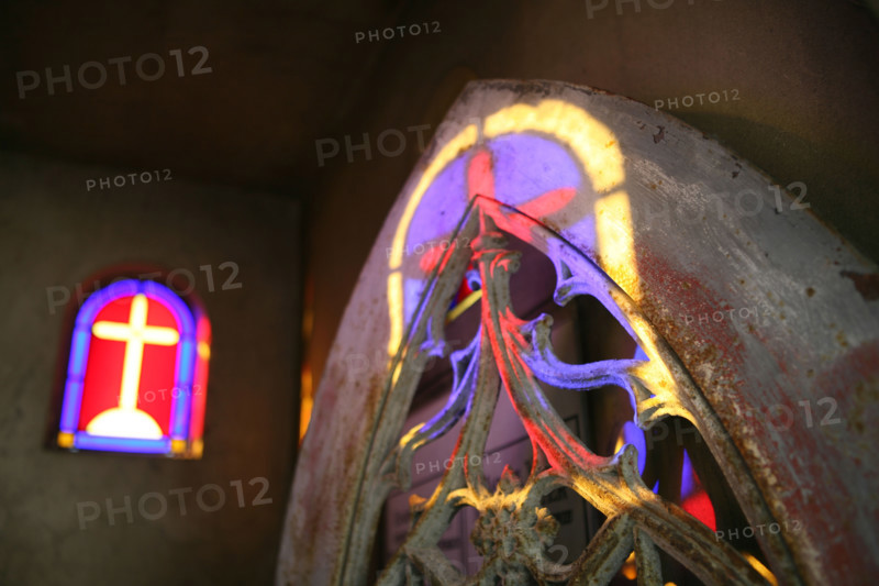 France, reflection of a cross in a chapel