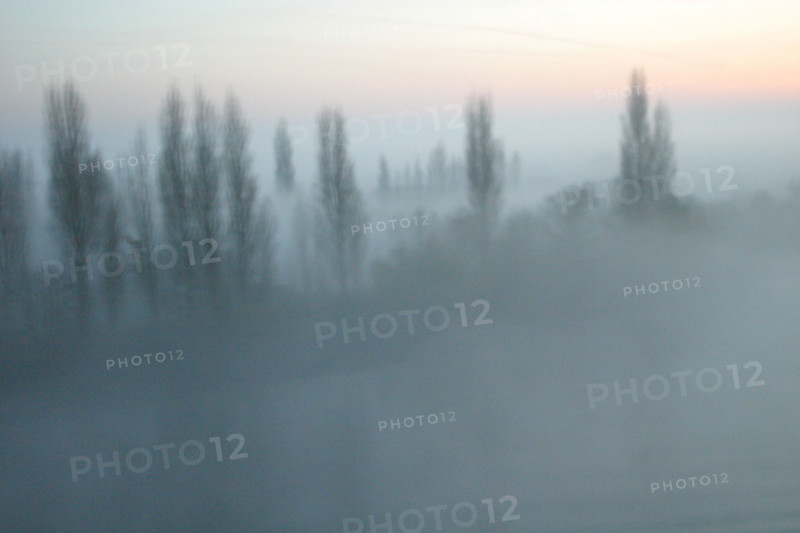 France, valley of the seine around duclair in the fog (as seen from a cargo ship)