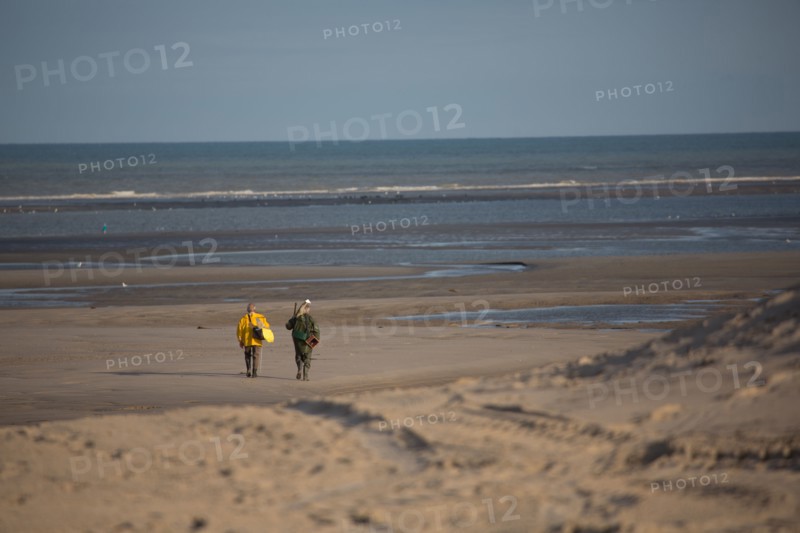 Le Touquet Paris Plage, fishermen in yellow oilskins