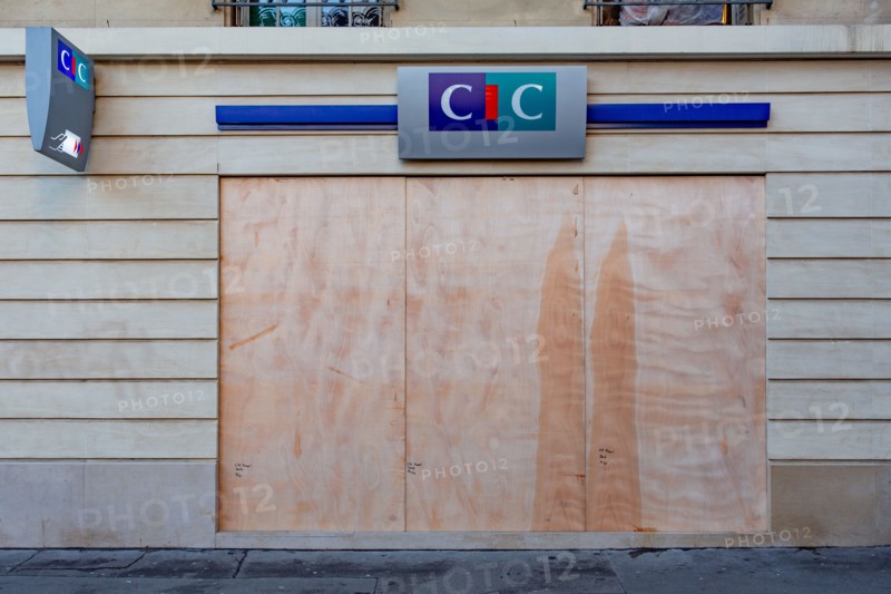 Paris, windows of a bank protected with sealed wood panels